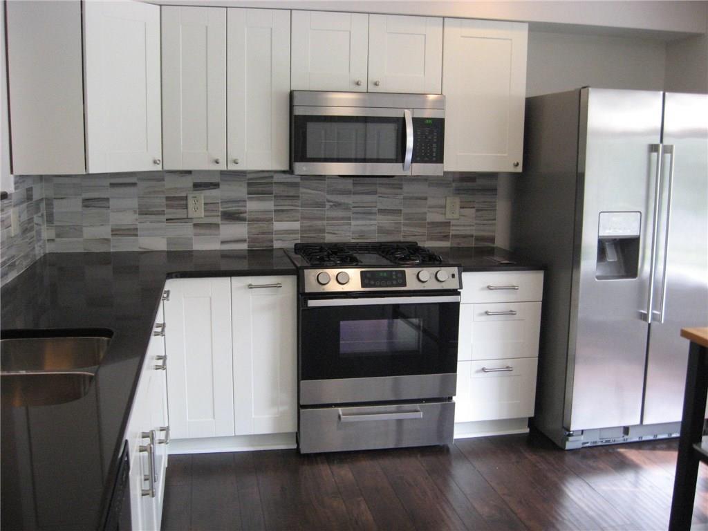 150 Shadow Ridge Drive Pittsburgh, PA 15238 - Photo 12 of 23 ANOTHER VIEW OF KITCHEN W/HARDWOOD