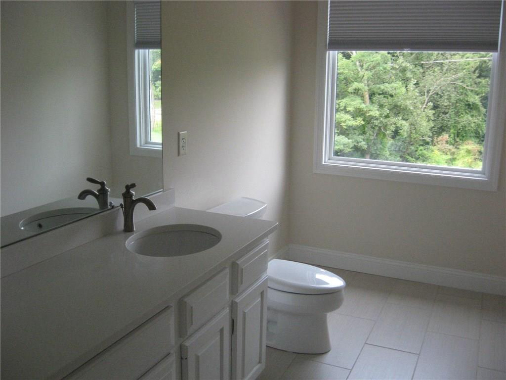 150 Shadow Ridge Drive Pittsburgh, PA 15238 - Photo 16 of 23 BRAND NEW UPDATED BATHROOM WITH PICTURE WINDOW