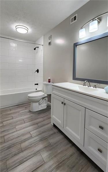 401 Park Ridge Circle Marietta, GA 30068 - Photo 11 of 15 a bathroom with a double vanity sink mirror and toilet
