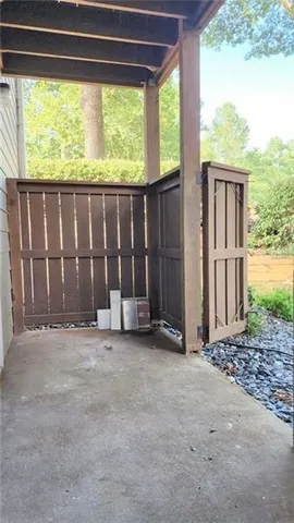 a view of a house with porch and wooden floor