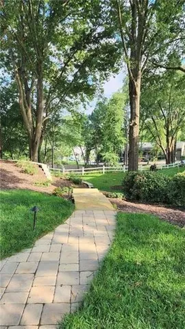 a view of backyard with green space