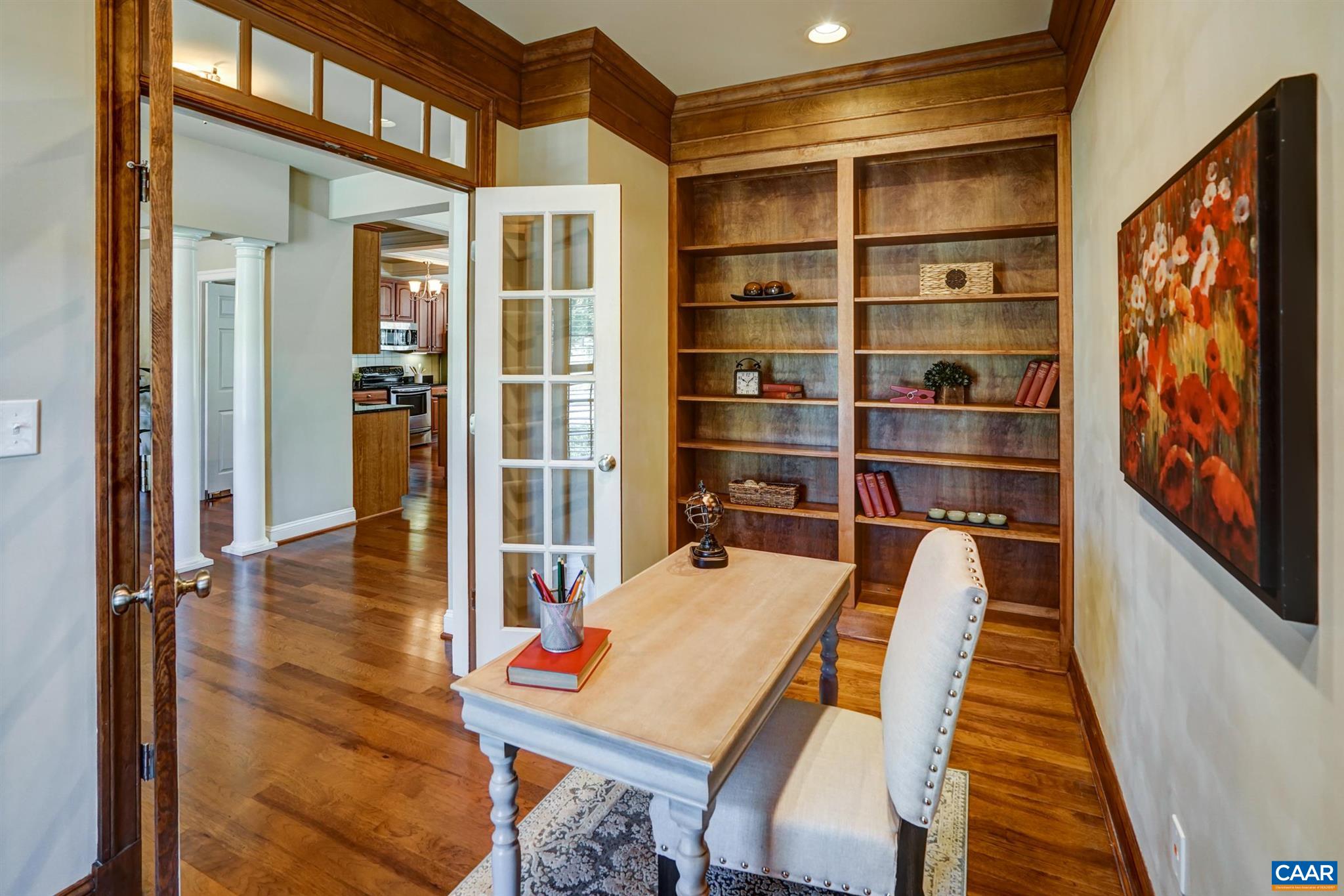 5327 Raven Stone Road Crozet, VA 22932 - Photo 11 of 67 a room with wooden floor and furniture
