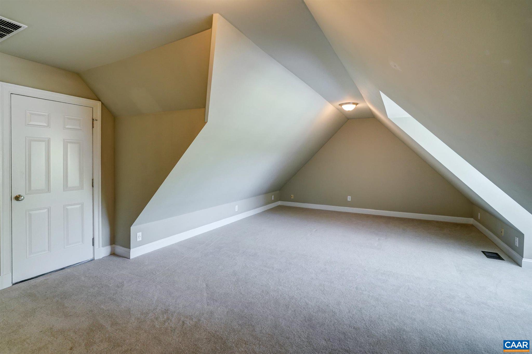 5327 Raven Stone Road Crozet, VA 22932 - Photo 42 of 67 a view of an empty room with windows