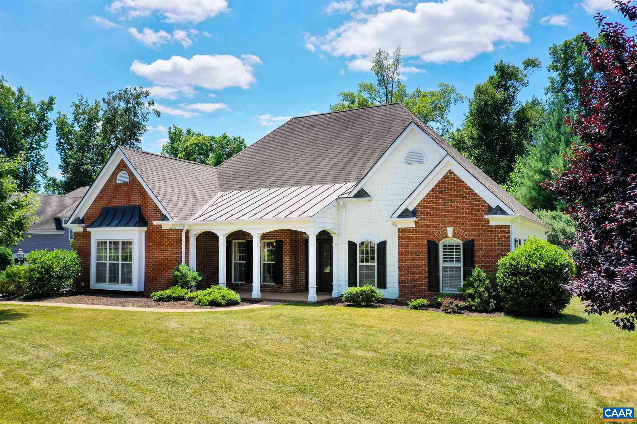 5327 Raven Stone Road Crozet, VA 22932 - Photo 54 of 67 front view of a house with a yard