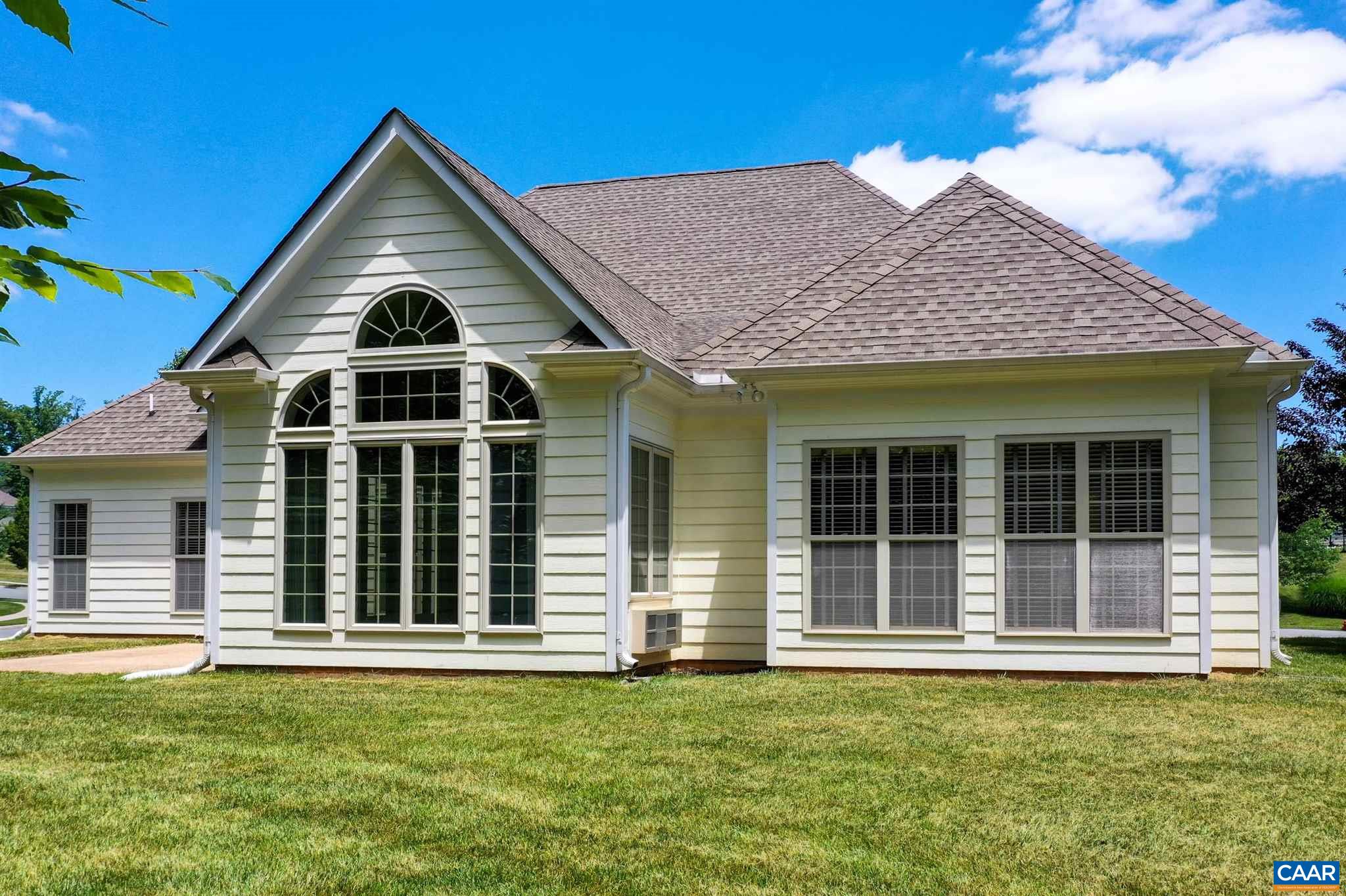 5327 Raven Stone Road Crozet, VA 22932 - Photo 62 of 67 a front view of a house with a garden