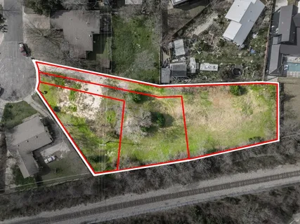 an aerial view of residential house with outdoor space