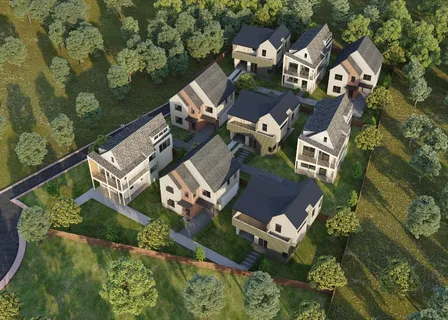 an aerial view of a house with a lake view