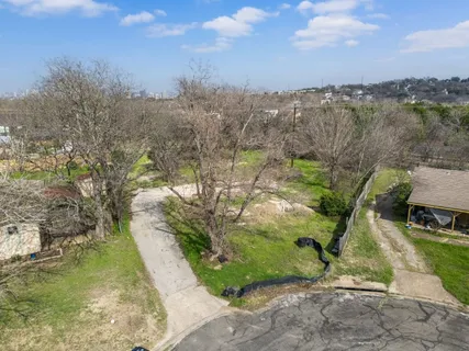 a view of a lake in middle of the town