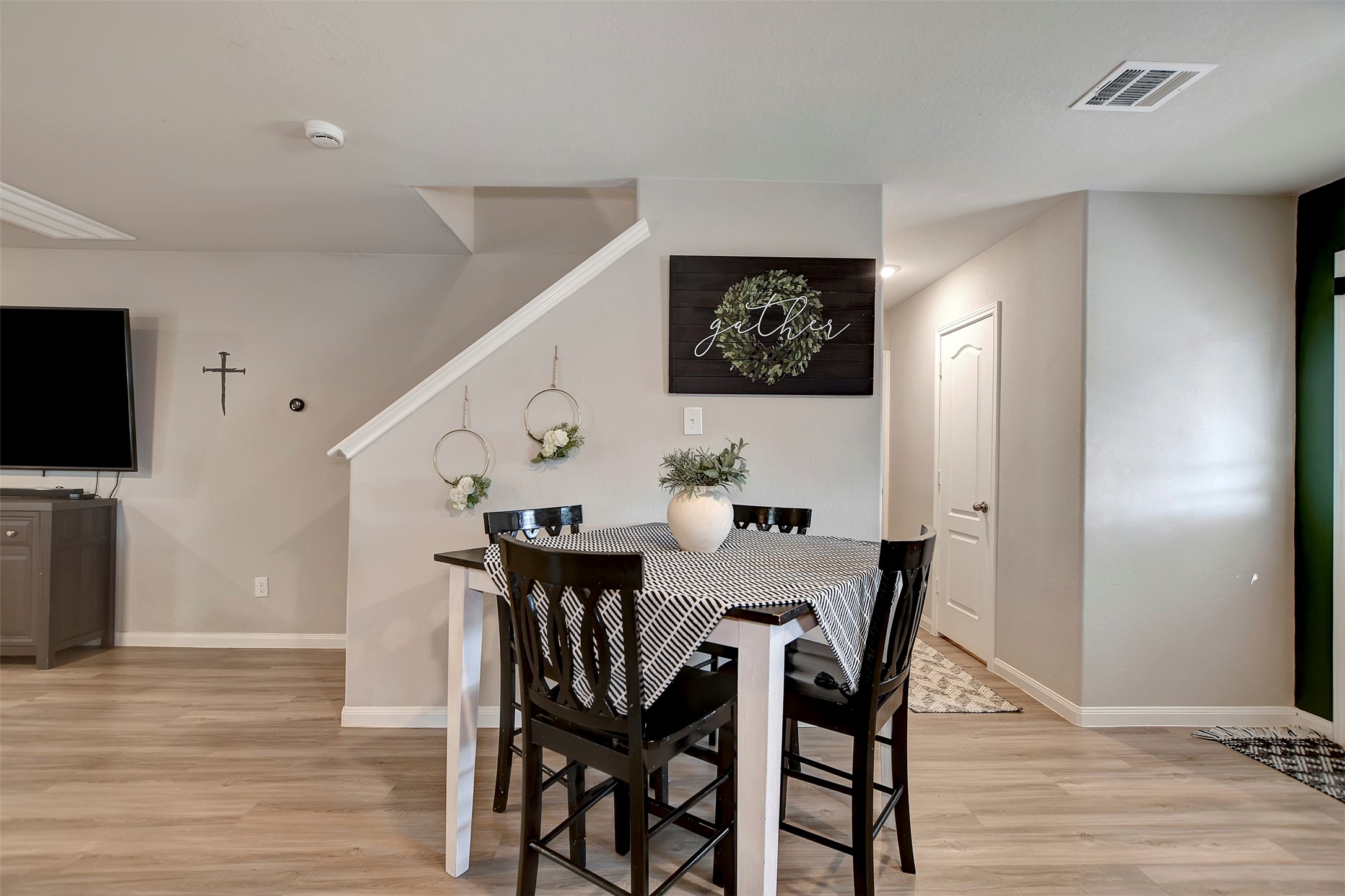 950 21st Street Hempstead, TX 77445 - Photo 13 of 35 a view of a dining room with furniture and wooden floor