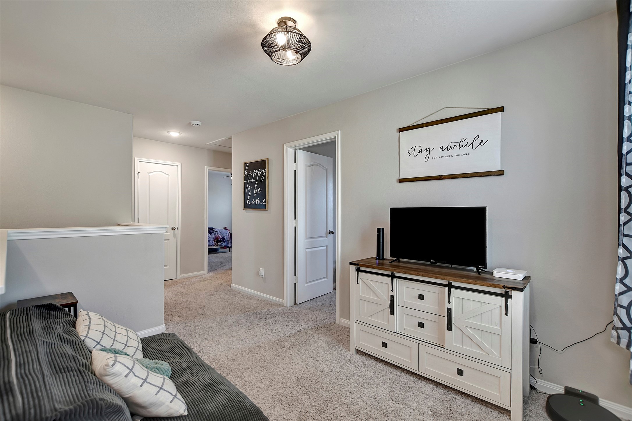 950 21st Street Hempstead, TX 77445 - Photo 18 of 35 a living room with furniture and flat screen tv