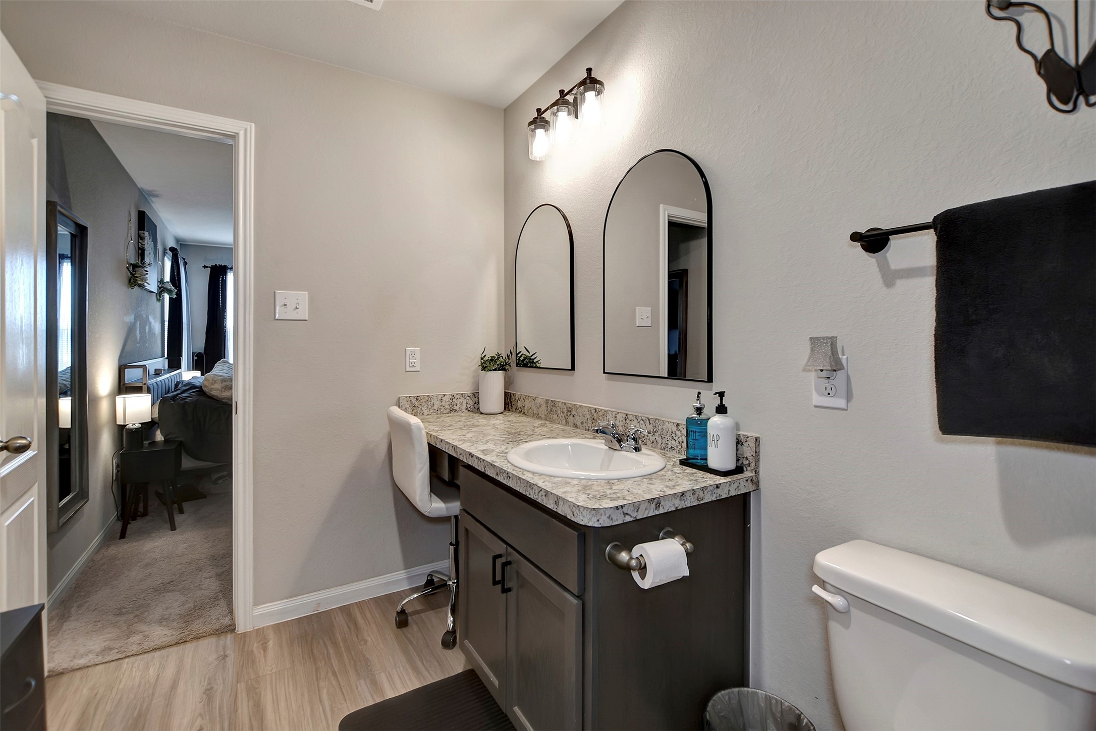 950 21st Street Hempstead, TX 77445 - Photo 25 of 35 a bathroom with a toilet sink and mirror
