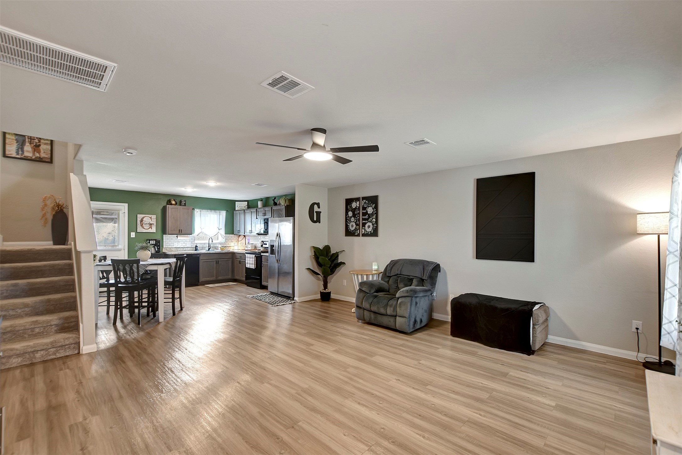 950 21st Street Hempstead, TX 77445 - Photo 4 of 35 a living room with lots of furniture and a wooden floor