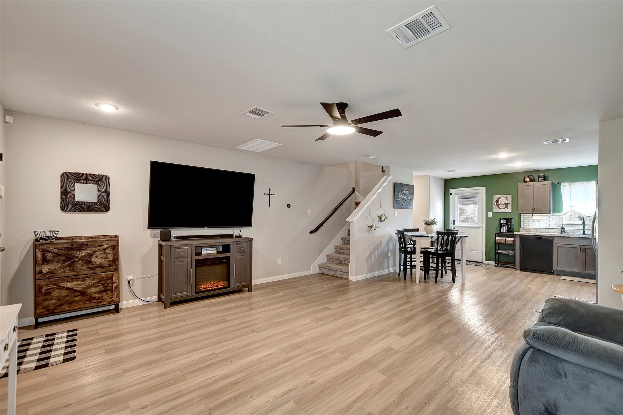 950 21st Street Hempstead, TX 77445 - Photo 7 of 35 a living room with furniture and a flat screen tv