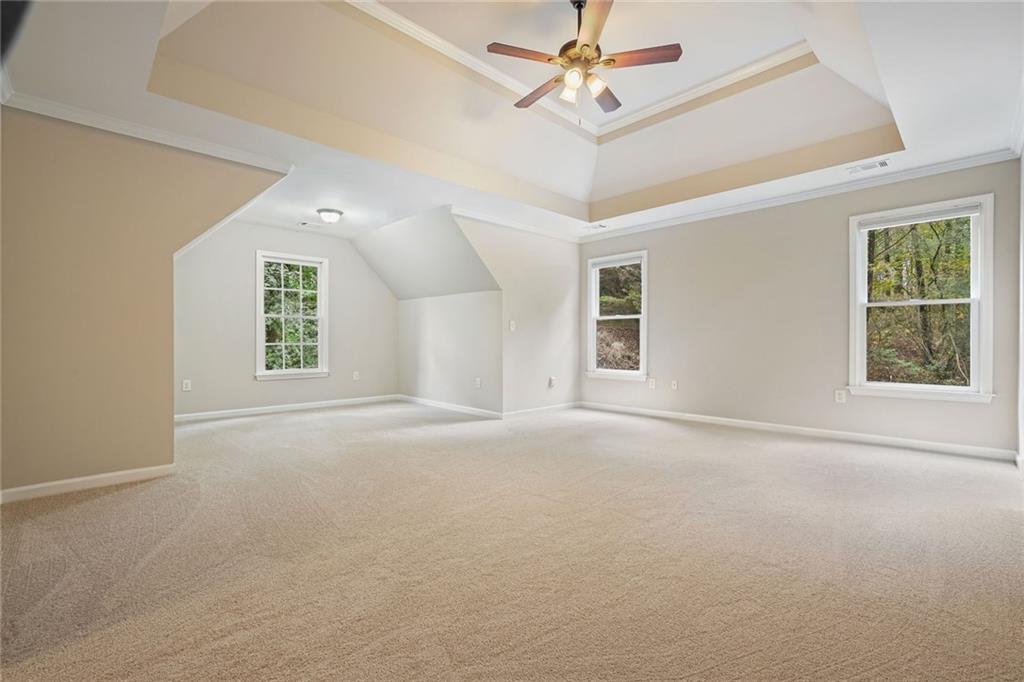 4555 Dennington Trace Cumming, GA 30028 - Photo 26 of 64 a view of an empty room with a window