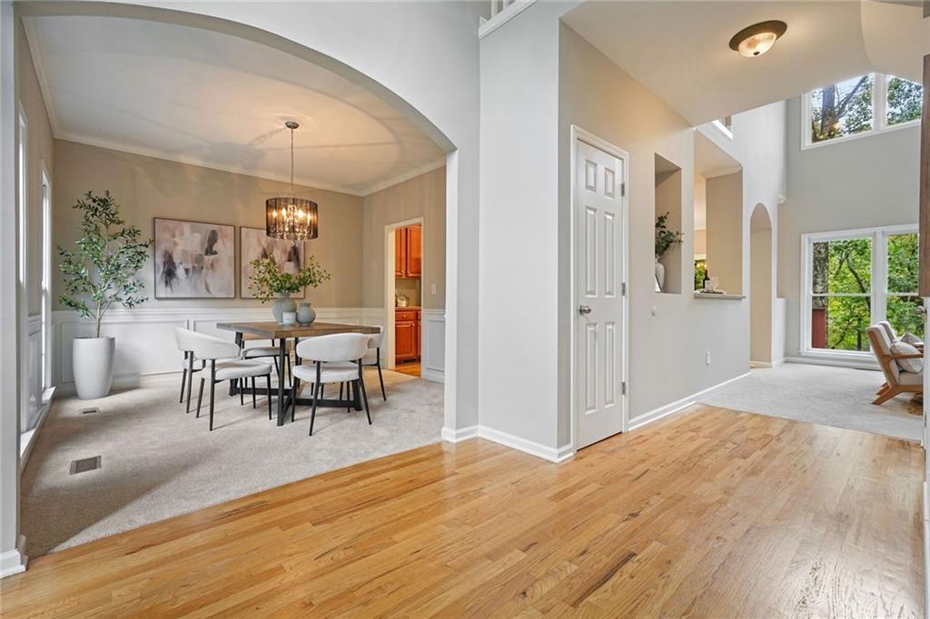 4555 Dennington Trace Cumming, GA 30028 - Photo 9 of 64 a view of a livingroom with furniture and a dining table