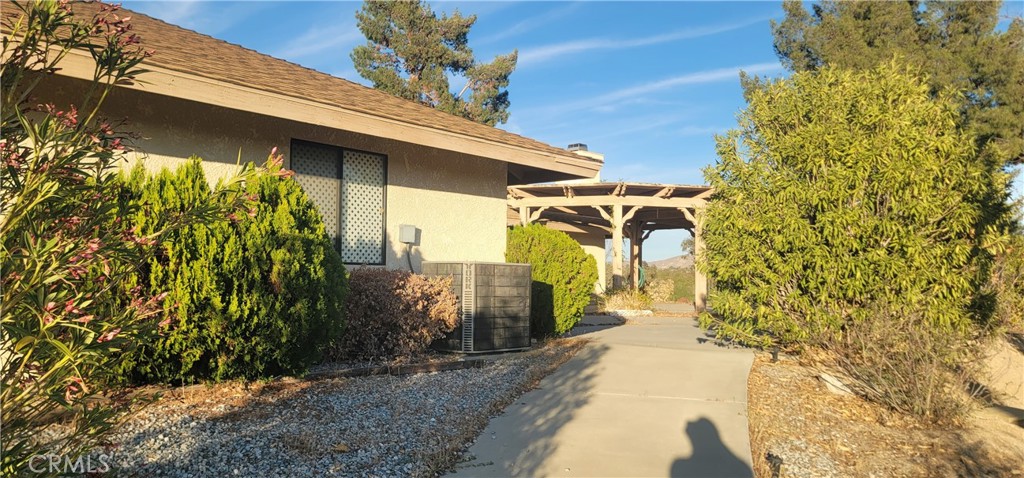 49833 Maccele Road Morongo Valley, CA 92256 - Photo 13 of 24 a view of a pathway of the building