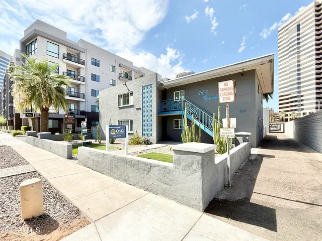 a view of a building with a patio