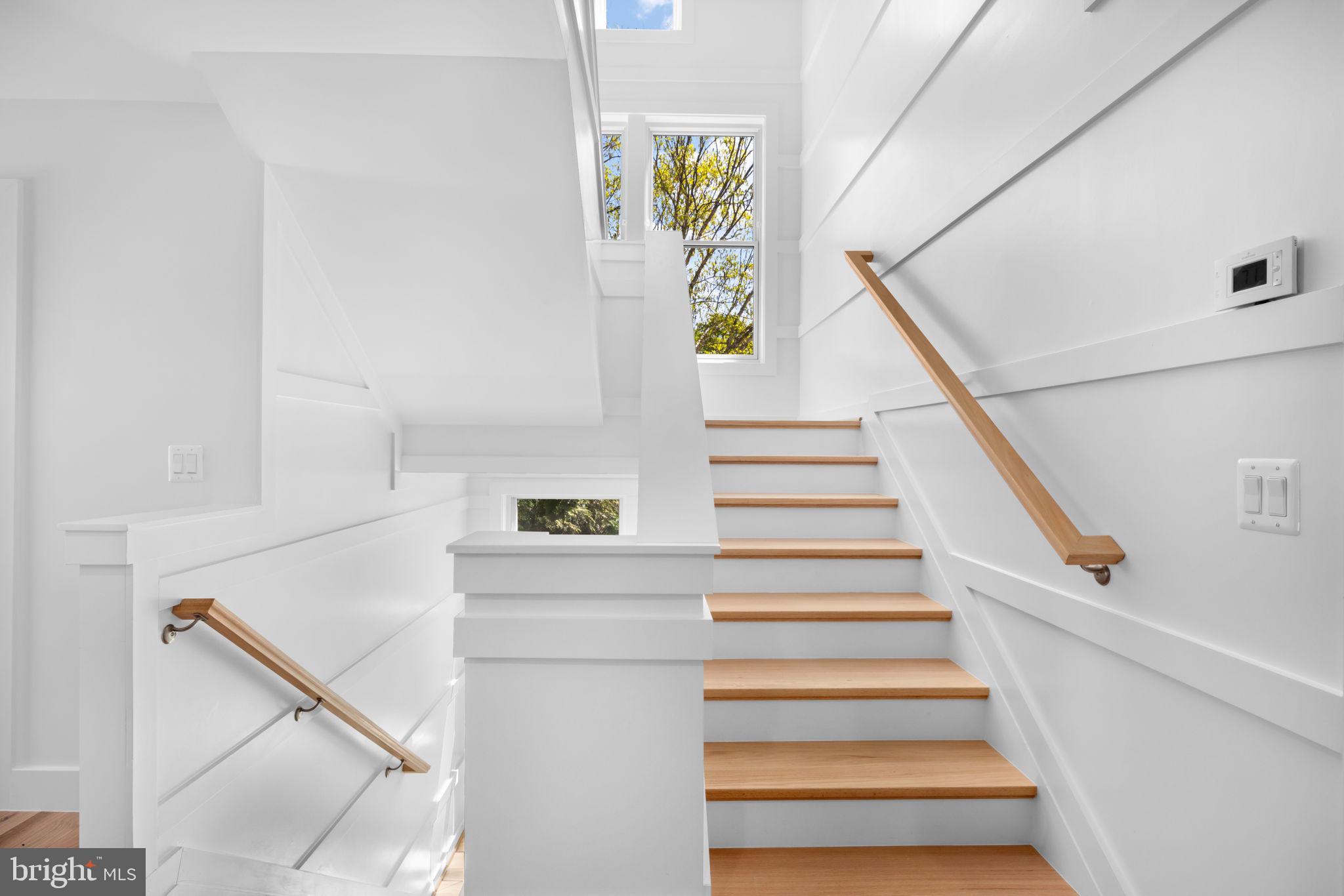 4892 MacArthur Boulevard Northwest Washington, DC 20007 - Photo 27 of 64 Four-story stairway
