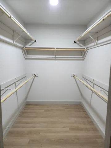 a view of an empty walk in closet