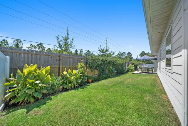 a garden view with a seating space