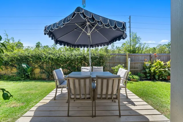a view of patio with furniture