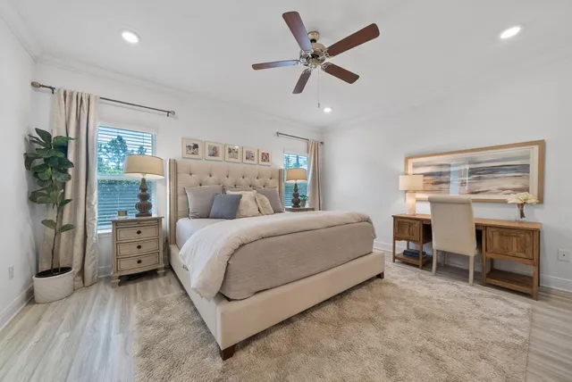 a bed room with furniture and a chandelier