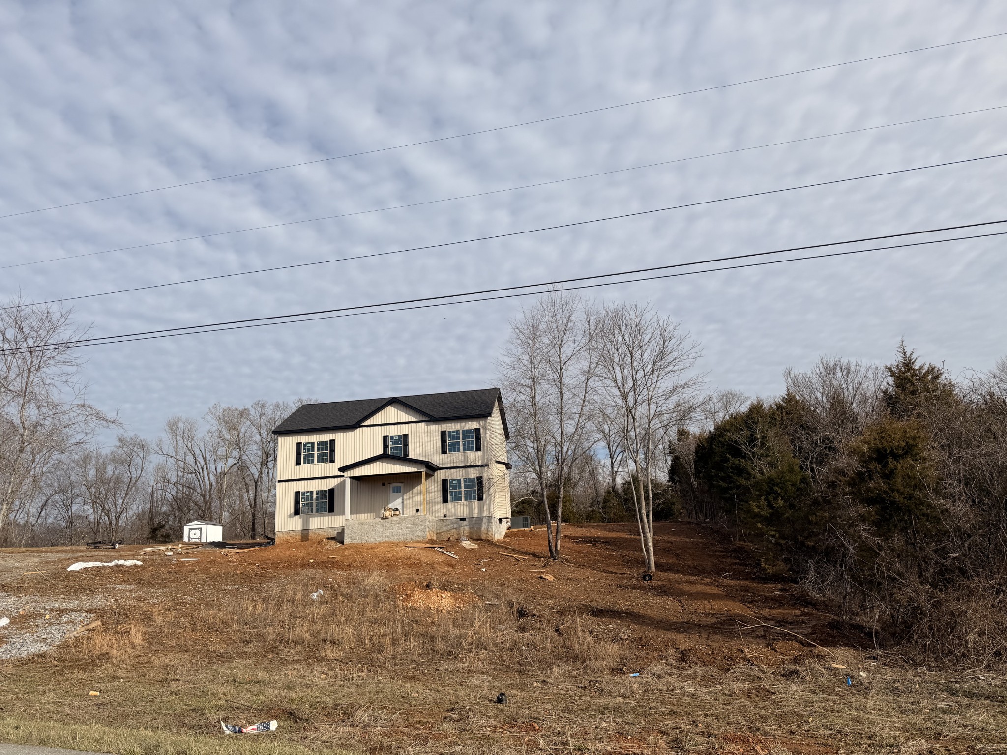 2 Caledonia Road Cadiz, KY 42211 - Photo 15 of 18 a front view of a house with a yard