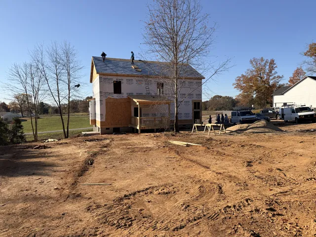 a view of a street with a building in the background