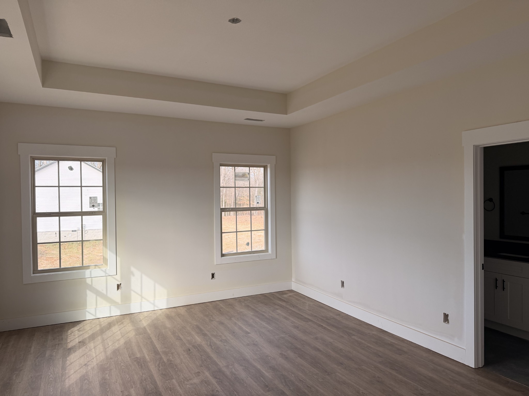 2 Caledonia Road Cadiz, KY 42211 - Photo 5 of 18 an empty room with wooden floor and windows