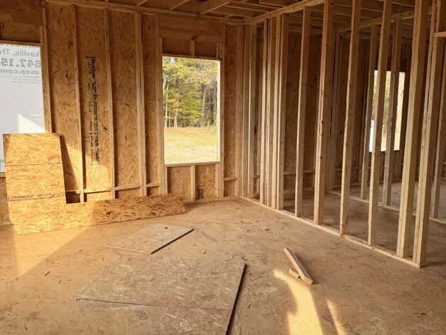 a view of backyard with tub