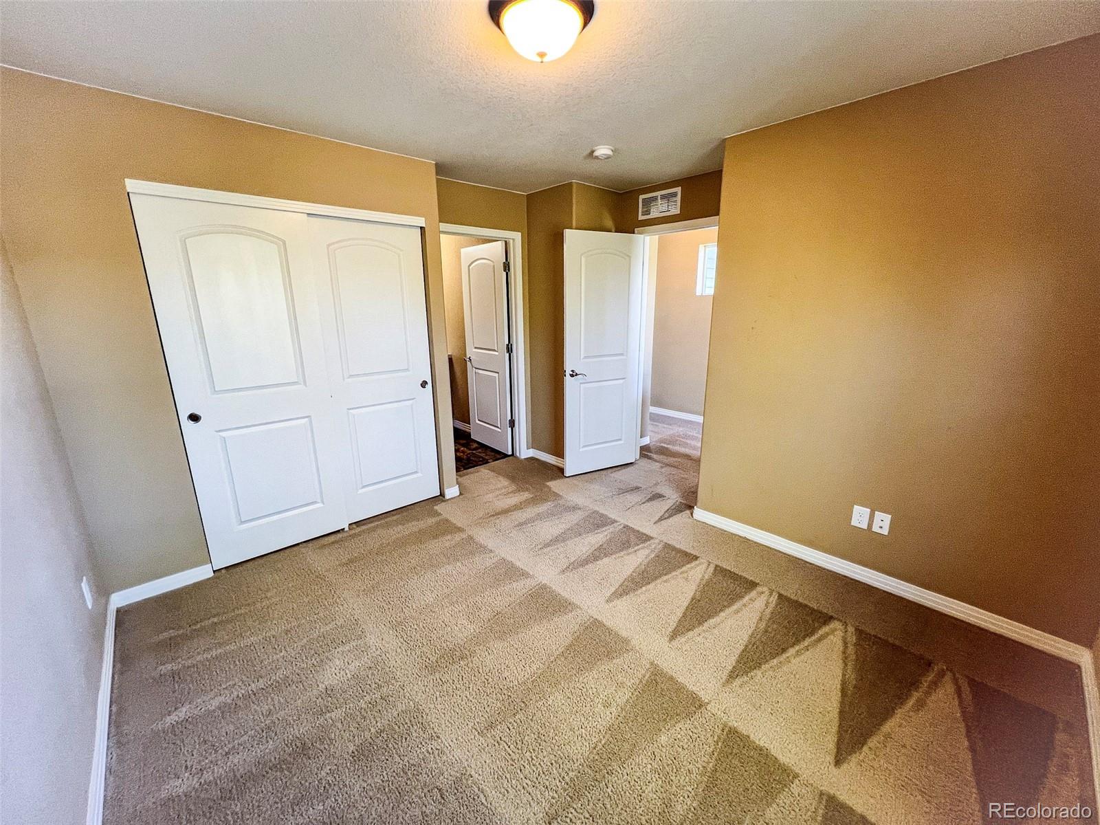 1524 Renaissance Drive Longmont, CO 80503 - Photo 13 of 23 a view of a room with an empty space