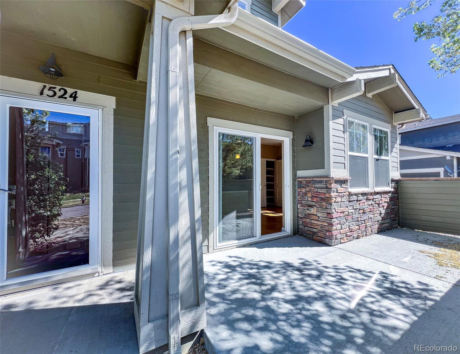1524 Renaissance Drive Longmont, CO 80503 - Photo 2 of 23 a view of a front door of house