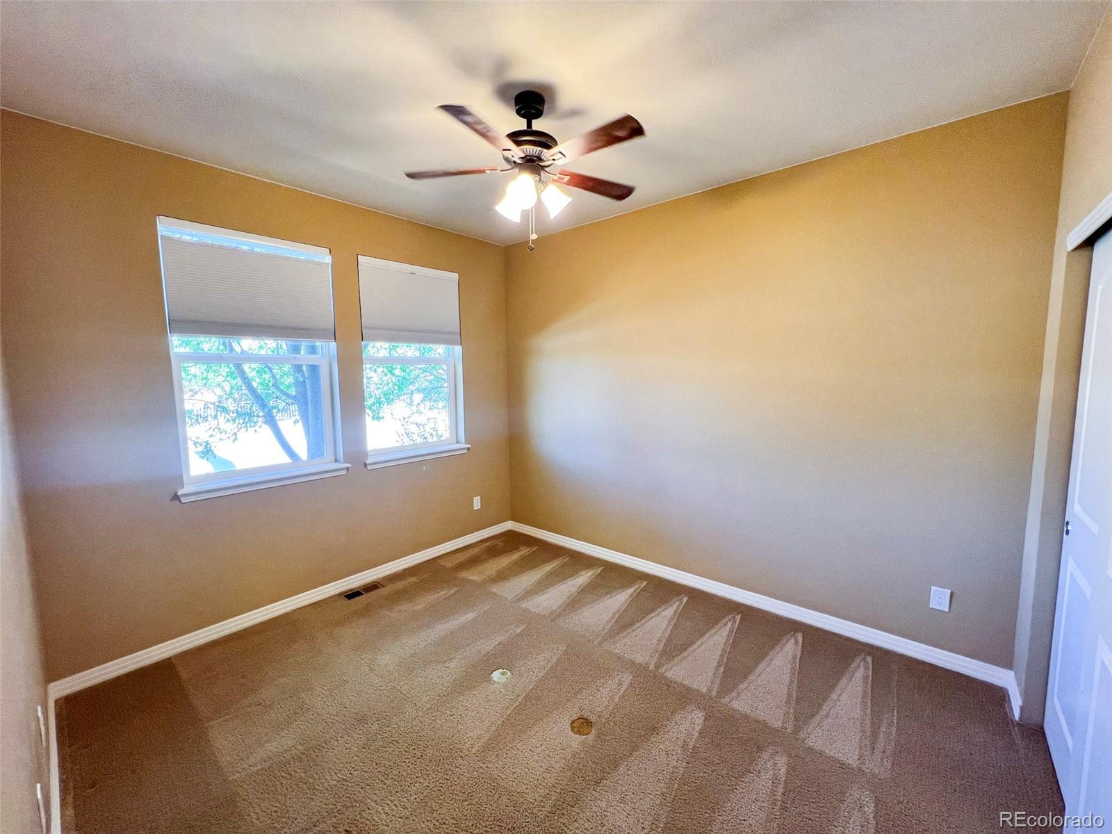 1524 Renaissance Drive Longmont, CO 80503 - Photo 10 of 23 a view of an empty room with a window