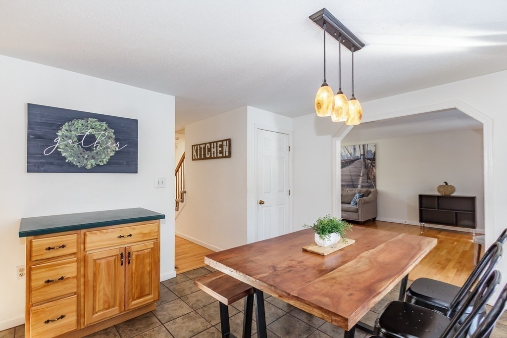979 Hildreth Street Dracut, MA 01826 - Photo 11 of 39 a view of a dining room with furniture