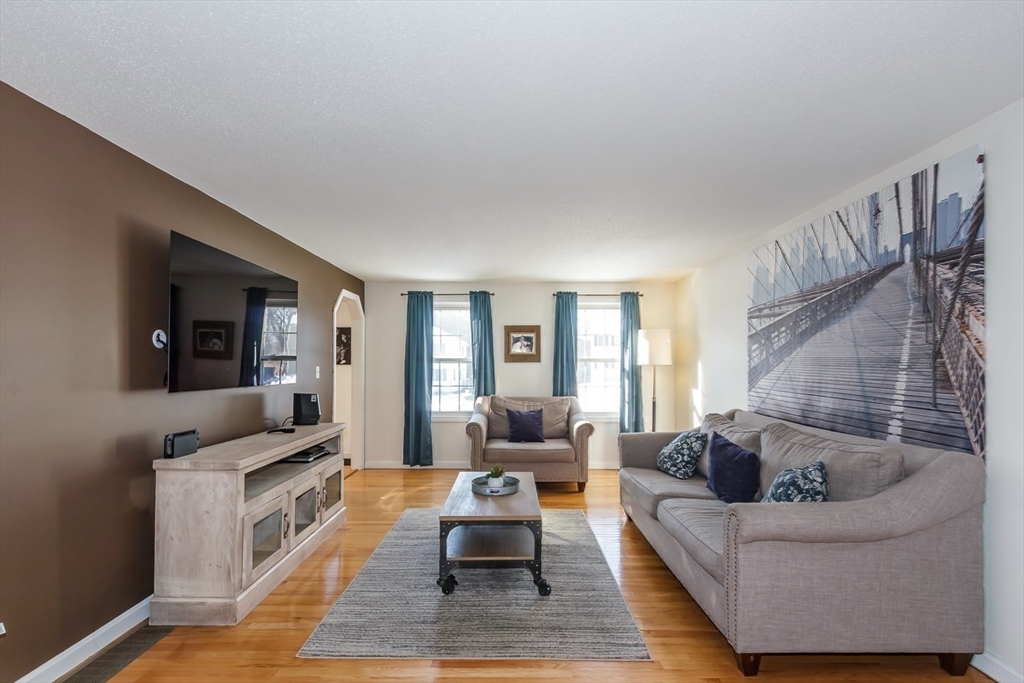979 Hildreth Street Dracut, MA 01826 - Photo 17 of 39 a living room with furniture and a couch