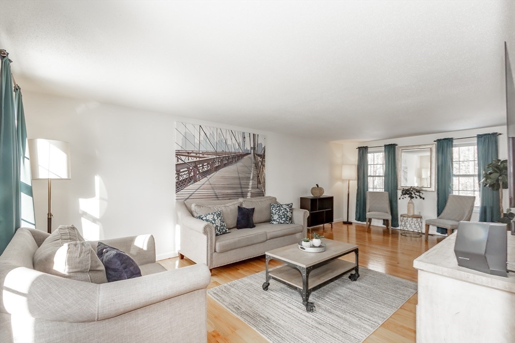 979 Hildreth Street Dracut, MA 01826 - Photo 19 of 39 a living room with furniture and a couch