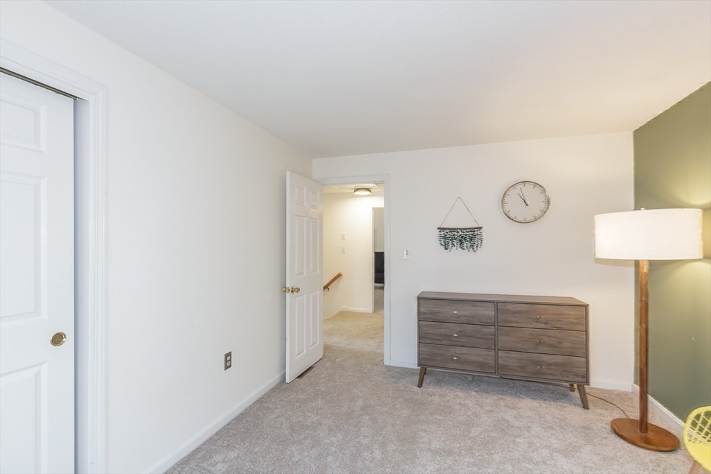 979 Hildreth Street Dracut, MA 01826 - Photo 24 of 39 a view of room with furniture and wall painting