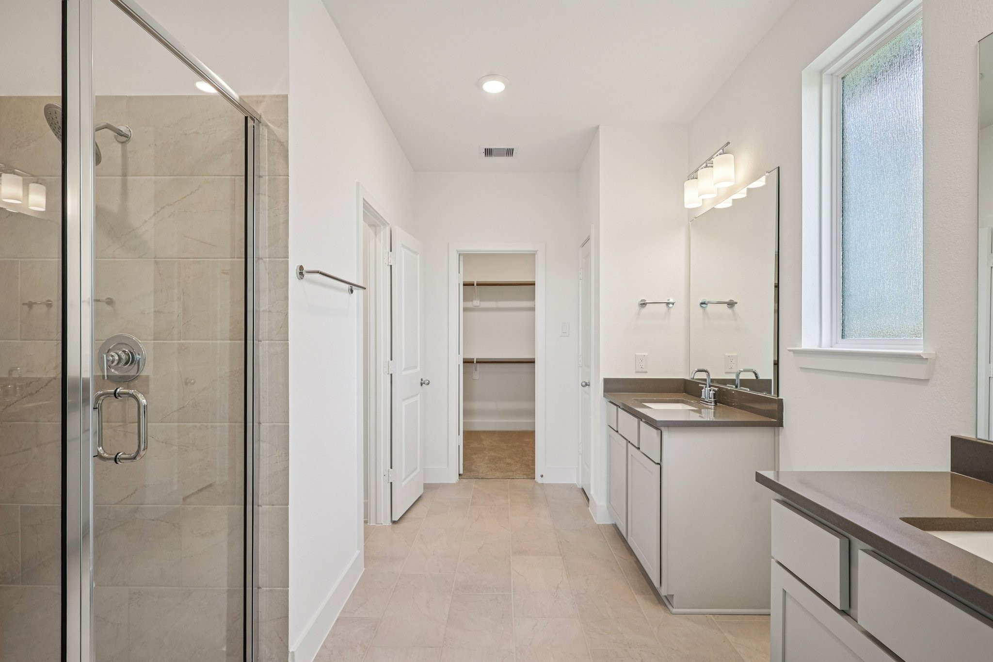 14465 Trumpet Lane Splendora, TX 77372 - Photo 3 of 12 a bathroom with a granite countertop sink mirror and shower