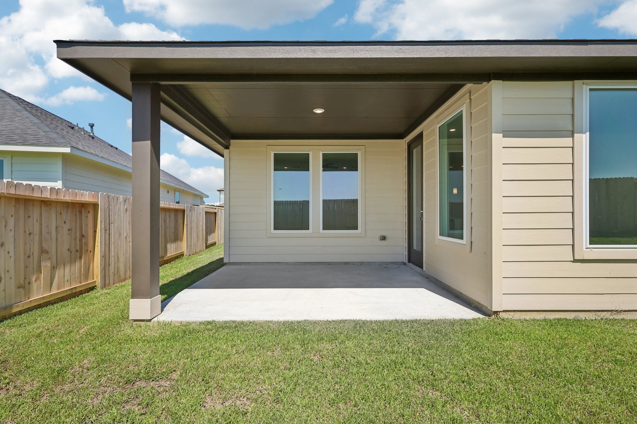 14465 Trumpet Lane Splendora, TX 77372 - Photo 8 of 12 a view of house with backyard