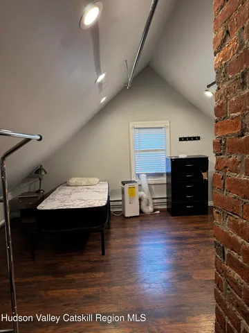 a view of livingroom with furniture and wooden floor
