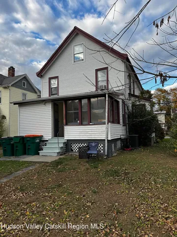 a house view with a garden space