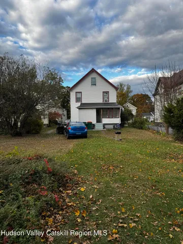 a house view with a garden space