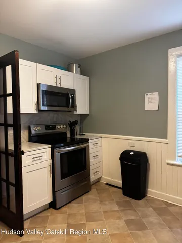 a view of a kitchen with a sink