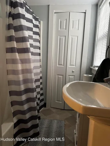 a bathroom with a sink and a bathtub