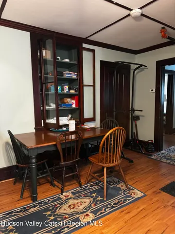 a view of a workspace with furniture