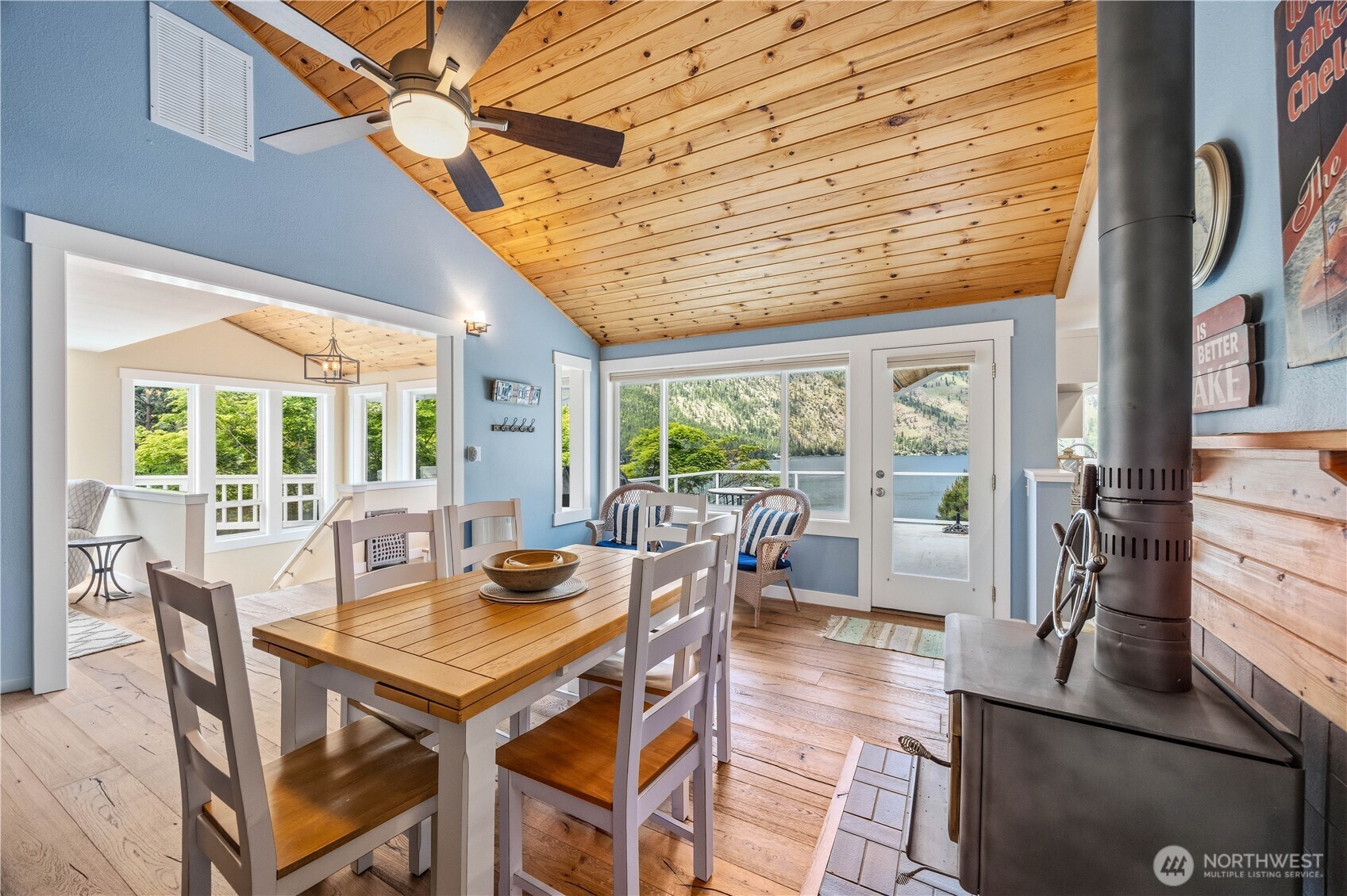 141 Sunset Place Manson, WA 98831 - Photo 12 of 38 a view of a dining room with furniture window and outside view