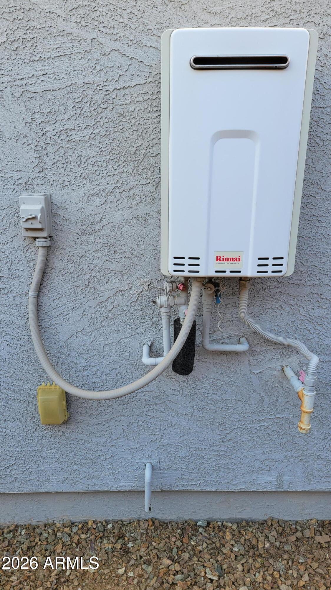 1313 East Glass Lane Phoenix, AZ 85042 - Photo 51 of 55 Tankless Gas Water Heater