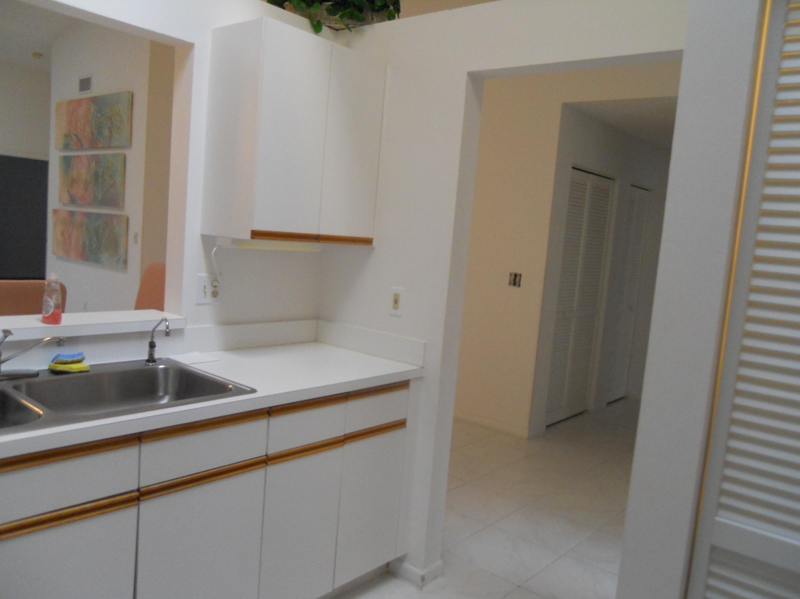 8425 Winding Stream Lane Boca Raton, FL 33496 - Photo 8 of 18 Kitchen out to Living areas