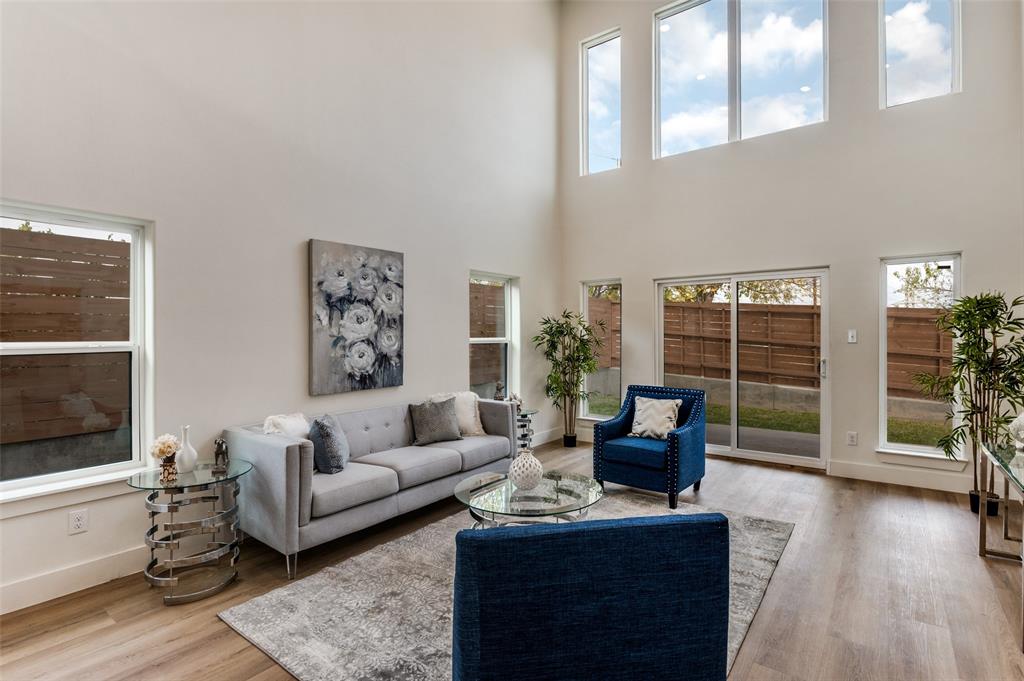 1409 Doyle Avenue Dallas, TX 75203 - Photo 7 of 40 a living room with furniture and large windows