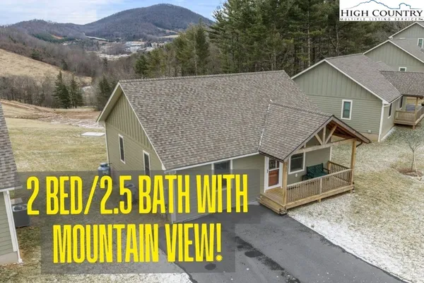 a view of a house with roof deck